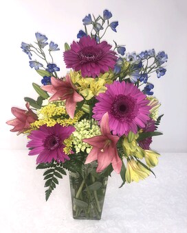 Deluxe size, inches height and inches wide.