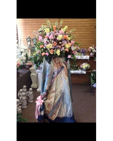On Easal w/large floral size, inches height and inches wide.
