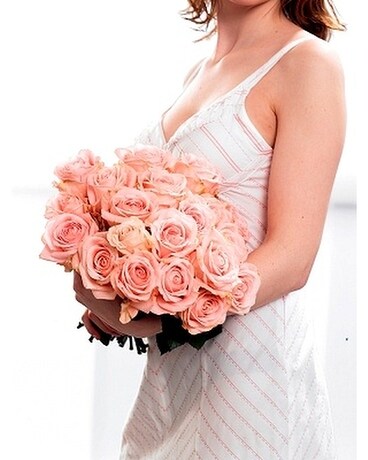 Double doz. pink roses arranged with Godiva chocolates size, inches height and inches wide.