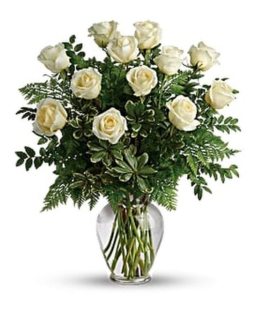 Dozen White Roses Vased Deluxe - 12 white roses vased with extra filler flowers size, inches height and inches wide.