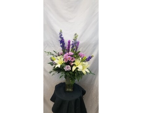 Deluxe size, inches height and inches wide.