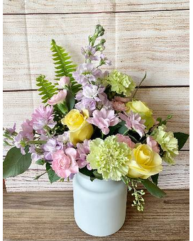 Deluxe-adds 3 more roses size, inches height and inches wide.