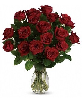 With orchids in a crystal vase size, inches height and inches wide.