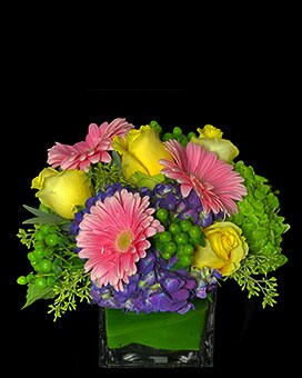 More Flowers & Larger Vase (12inW x 11inH) size, inches height and inches wide.