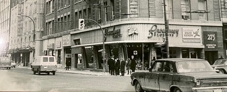 A group of people standing on the street