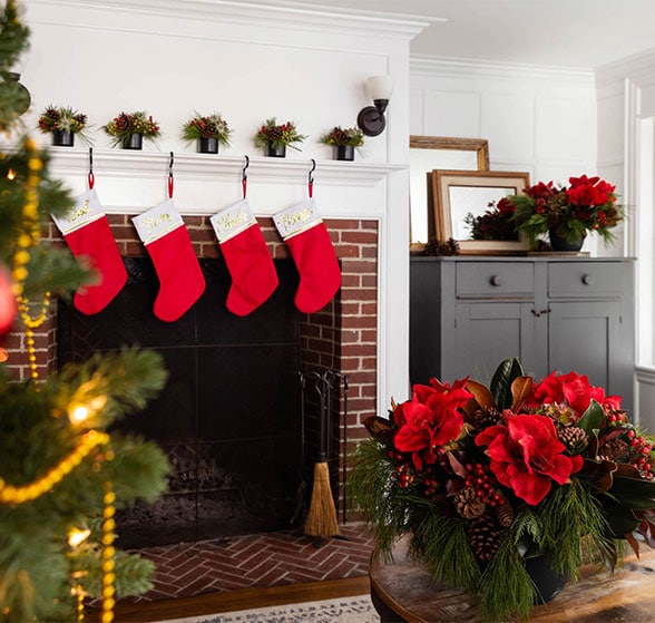 A display of a holiday home with a festive fireplace