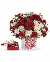 Deluxe size, 12 inches height and 12 and a half inches wide.