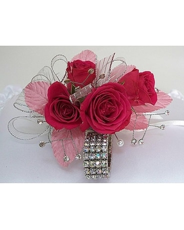 Four Sweet Heart Rose Corsage - Ht. Pink in Indianapolis IN