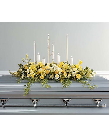 YELLOW CASKET SPRAY WITH ROSARY & CANDLES