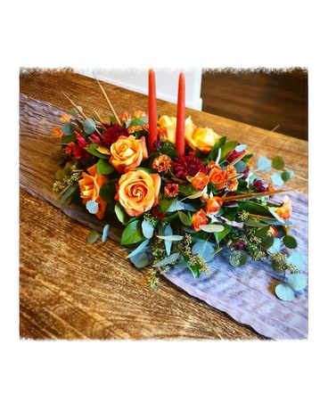 Designers Choice Centerpiece with candles Flower Arrangement