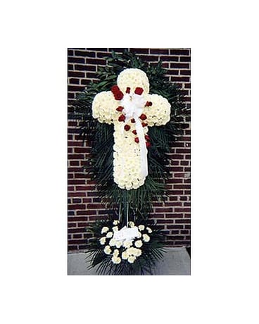 White Cross with Stash of Red Roses