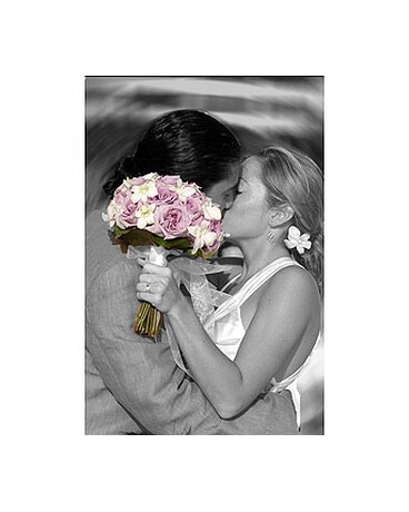 Lavender roses with white orchid bouquet