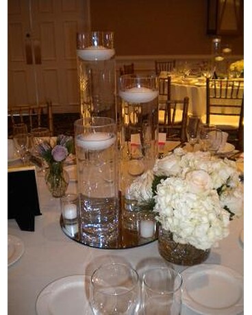 teared vases with flowers