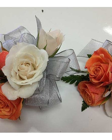 Wrist Corsage & Boutonniere of Orange & White Spray Roses by Vivian