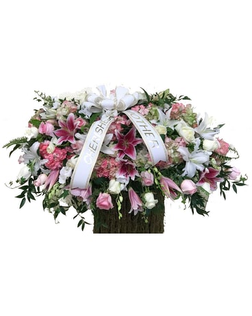 Delicate Casket Spray Flower Arrangement