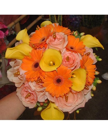Gerbera,daisies,roses and calla lilies