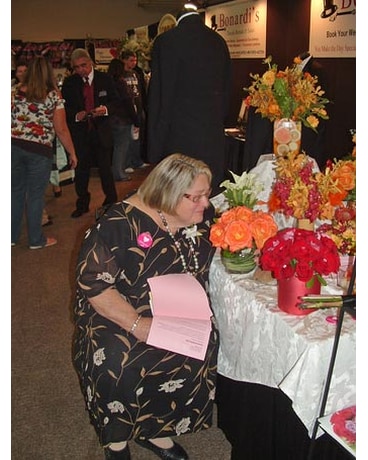 Joan smelling the roses