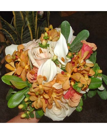 Orchids,calla lilies and roses