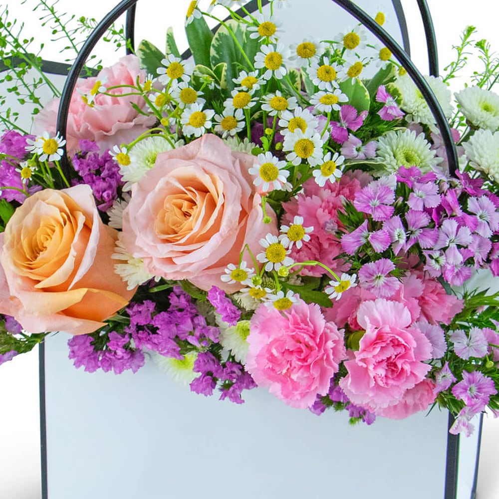 Seasonal Garden Blooming Tote in South Hadley MA - Carey's Flowers