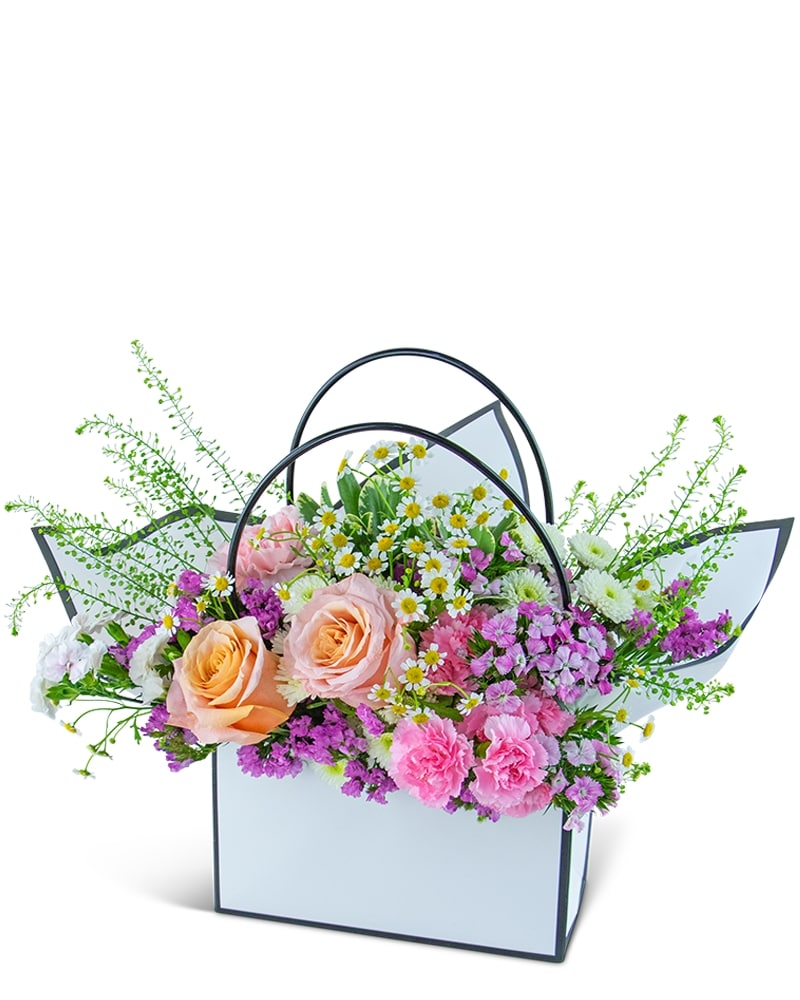 Seasonal Garden Blooming Tote in South Hadley MA - Carey's Flowers