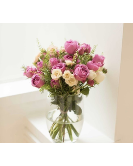 One Month FREE With a 6 month subscription Flower Arrangement