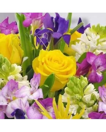 Florist's choice ( Purple and Yellow ) Flower Arrangement