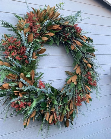 Magnolia Eucalyptus and Pepperberry Wreath Flower Arrangement