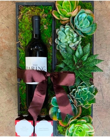 Wine and succulents Flower Arrangement