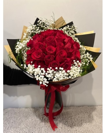 Red Roses Wrapped Flower Arrangement