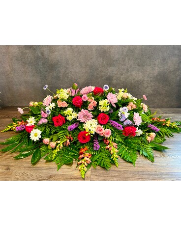 Blooming Girl's Casket Spray With Love Flower Arrangement