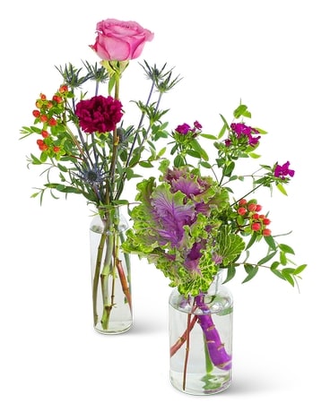 Bottles of Serene Buds Flower Arrangement