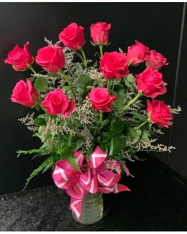 Legacy’s perfect dozen in pink Flower Arrangement