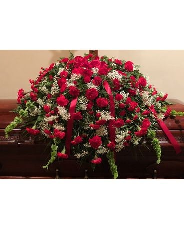 Legacy’s red carnation and babies breath mix Funeral Casket Spray Flowers