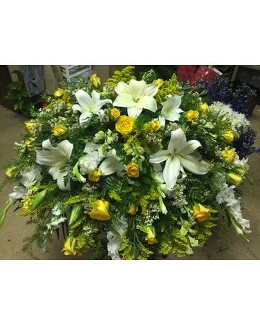 Legacy’s yellow and white mix Funeral Casket Spray Flowers