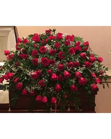 Legacy’s classic red rose and babies breath Funeral Casket Spray Flowers