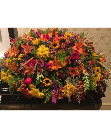 Legacy’s bold fall mix Funeral Casket Spray Flowers