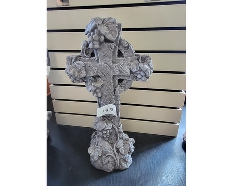 Cross Statue Flower Arrangement
