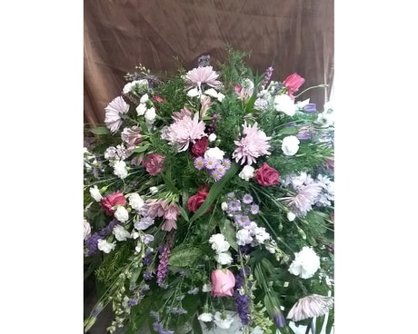Shades of Purple Splash of Pink Funeral Casket Spray Flowers