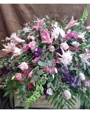 Shades of Pink and Purple Funeral Casket Spray Flowers