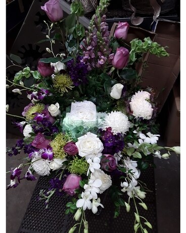 Purple and White Urn Ring Funeral Arrangement