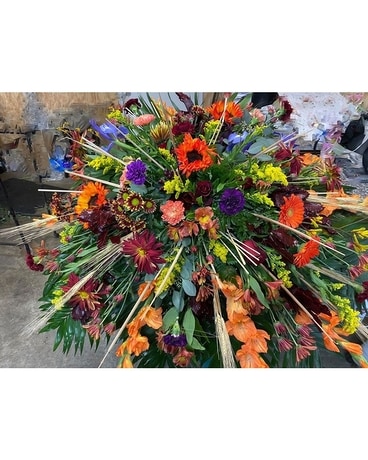 Colorful Reflections Funeral Casket Spray Flowers