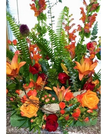 Shades of Orange Urn Ring Funeral Arrangement