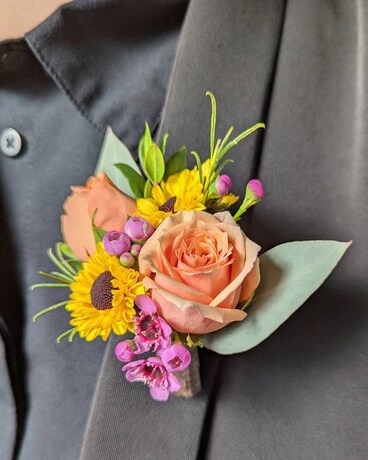 Flowers + Foliage Boutonniere Flower Arrangement