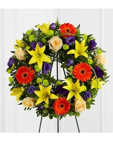 RADIANT REMEMBRANCE™ WREATH Flower Arrangement