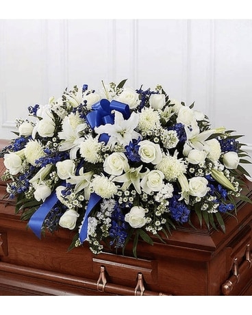 Blue and White Casket Spray Funeral Arrangement