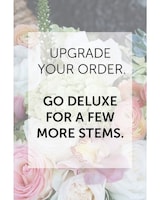 Deluxe size,  inches height and  inches wide.