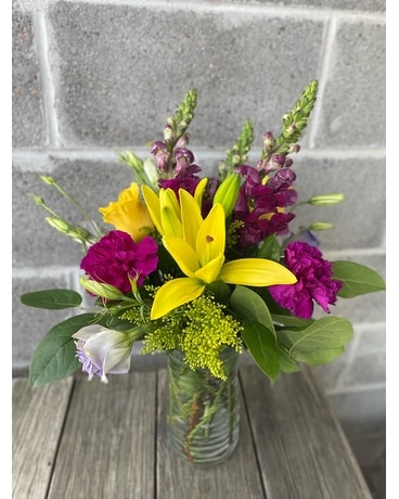 Purple and Yellow Flowers Flower Arrangement