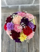 Deluxe - 24 carnations + baby's breath size,  inches height and  inches wide.