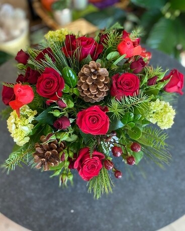 Cardinal's Delight Winter Roses Flower Arrangement