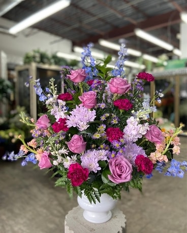 Light of Lavender Sympathy Urn Funeral Arrangement